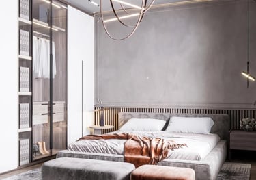 a bedroom with a large bed and a couch Nour Nagy Designs