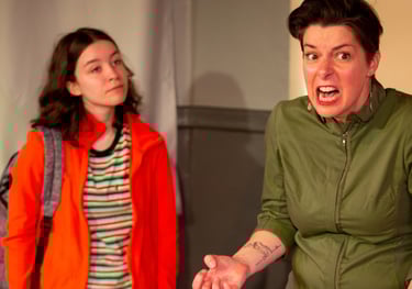 Preteen Lucy watches as her mother Johanna grimaces in frustration