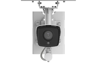 a solar powered security camera mounted on a wall