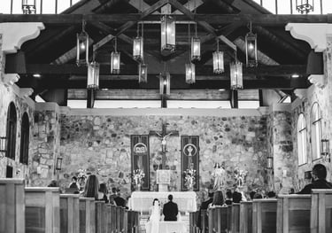 a bride and groomsmen are standing in a church
