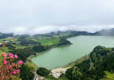 a view of a lake from a mountain