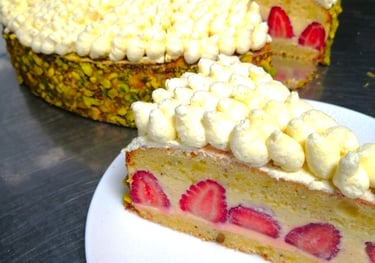 a strawberry cake with a slice of cake on top of it