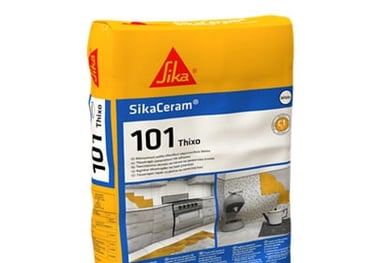 Silka adhesive for tiles and ceramic slabs