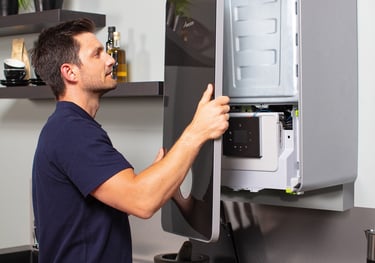 boiler during a breakdown repair, diagnosing and fixing issues to restore heating and hot water