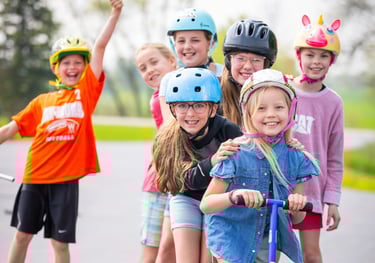 a group of children's skateboarders on a skateboard