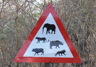 warning sign in the Hluhluwe and Umfolozi game park, South Africa
