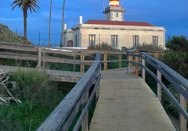 path to a lighthouse on the beach