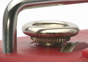 Close up of a tin opener.