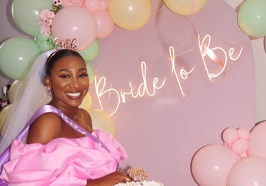 a black woman smiling at her bridal shower, event photography