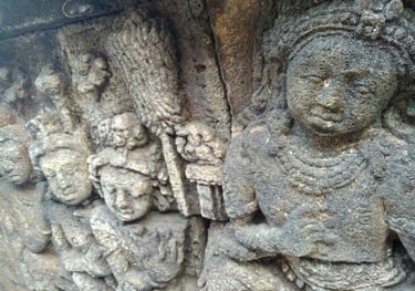 a stone carving on a temple in indonesia