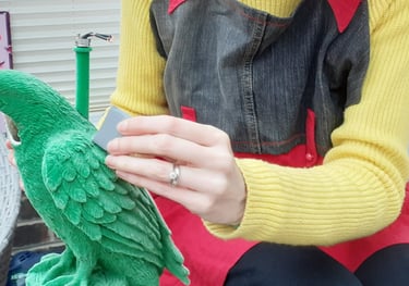 Mandy cleaning a plastic lamp base