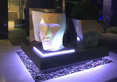 accent color lighting on feature statue