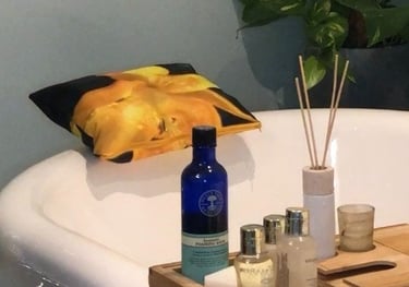 a bathtub ready for spa experience complete with waterproof bath cushion with yellow floral print