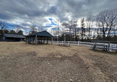 a horse arena and a clubhouse