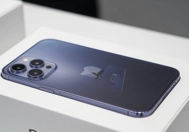 A clean, high-contrast photograph of high-tech consumer electronics boxed and ready for shipment. The lighting is bright and modern with Soft White highlights.