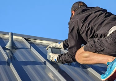 Clean the lint from the roof vent in Buckingham