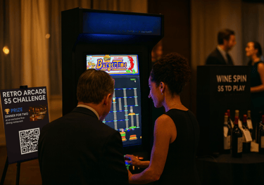 man and woman playing a retro arcade game at a fundraiser gala.