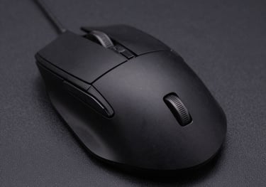 A high-quality studio photograph of a sleek, black ergonomic gaming mouse on a dark textured surface. Sharp focus and professional product lighting showing off the clean design lines.