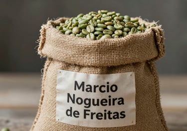 A textured burlap sack filled with green specialty coffee beans, labeled with the brand name Marcio Nogueira de Freitas.