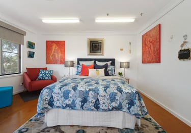 A beautifully styled bedroom designed for comfort, privacy, and a sense of coming home.