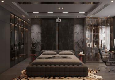 Luxury modern bedroom interior featuring a grey tufted bed, glass closet, and home office workstation.