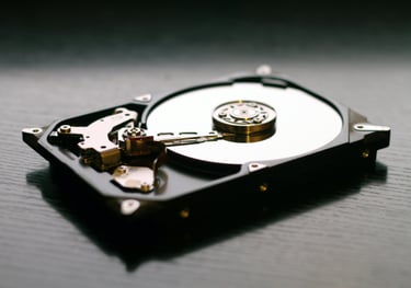 Lifestyle image of the interior of a computer storage drive on a black surface.