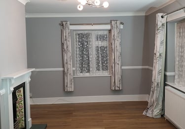 a freshly decorated grey living room in Bournemouth