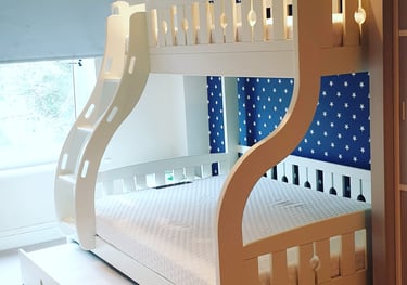 flat pack assembled bunk bed with a pull out trundle bed