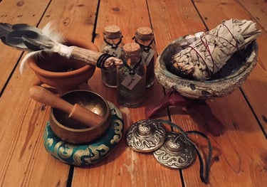 a table with a bowl of incense and a bowl of incense