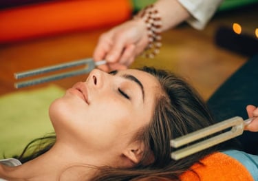 a woman getting her hair done by a hairdresser