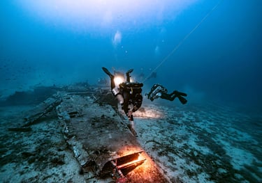 technical divers exploring a plane wreck in Malta. Damian Xuereb is the diver using a CCR rebreather