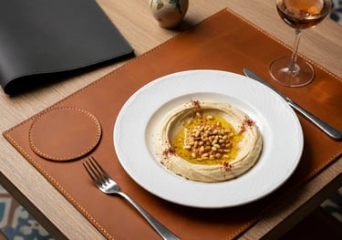 a leather placemat and coaster