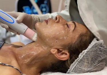 a woman is getting a facial lift in a beauty salon