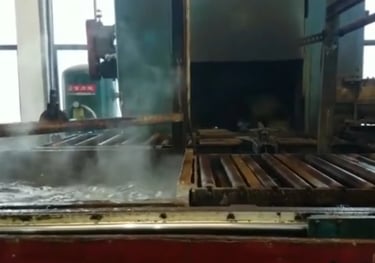 Rotational curing and cooling process for fitness ball production