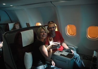Nick and Tracey Billington on a buisiness class flight to shanghai