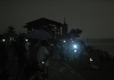 Nick and Tracey Billington in Hangzhou at the total solar eclipse, China