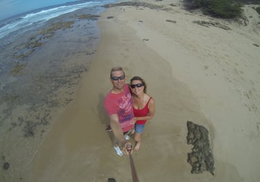 Tracey and Nick Billington at tofo Beach, Praia do Tofo, Mozambique