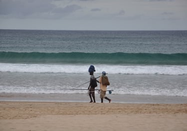 men fishing at tofo Beach, Praia do Tofo, Mozambique
