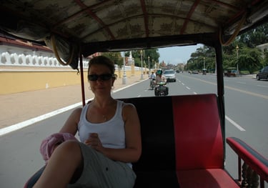 Tracey Billington in a tuk tuk in phnom penh, Cambodia