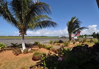 LAM airlines plane landing at Inhambane airport, Mozambique