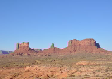 canyonlands national park in the desert with a blue sky