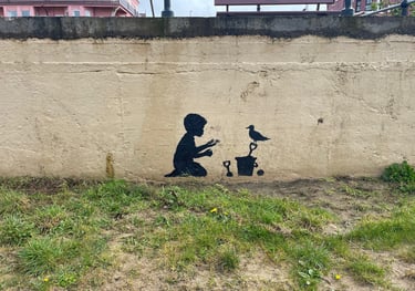 A fake Banksy on the seafront at Hoylake