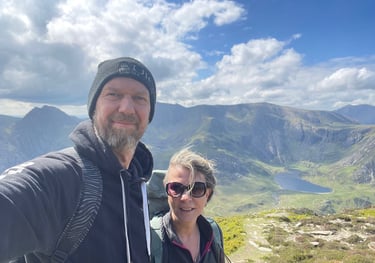 Nick and Tracey Billington at the summit of the Carnedd mountains, Snowdonia, Wales