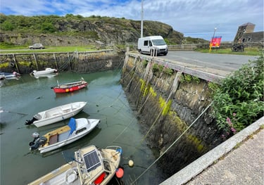 Nick and Tracey Billington camper at the harbour in Port Amlwch