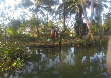 locals on the waterway at Alappuzha, Kerala, India