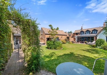 Well maintained garden. Professionally mowed lawn. Professionally designed planting scheme.