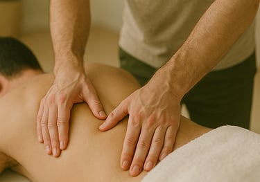 person on couch receiving a lower back massage in Leicester