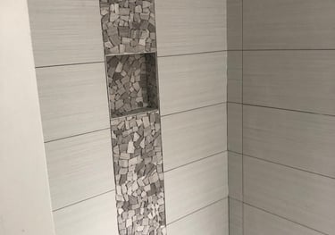 Image of custom shower tiling that uses different tiles