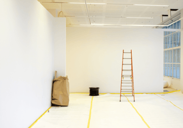 a ladder in an office undergoing remodeling