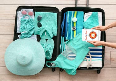 Picture of open suitcase in the process of packing